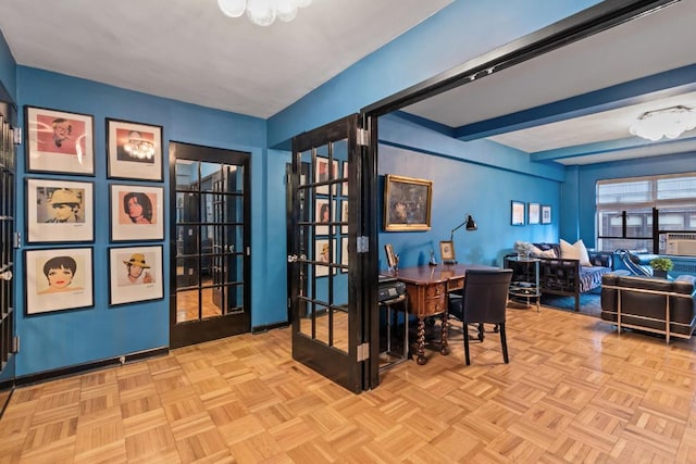 dining room featuring beam ceiling and light parquet floors