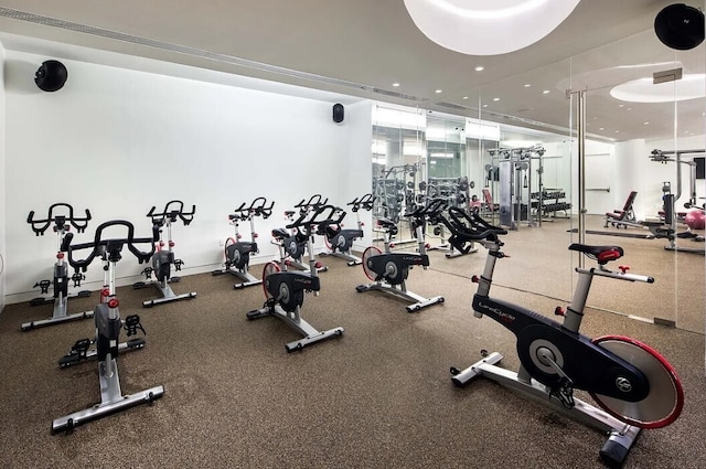 workout area featuring baseboards