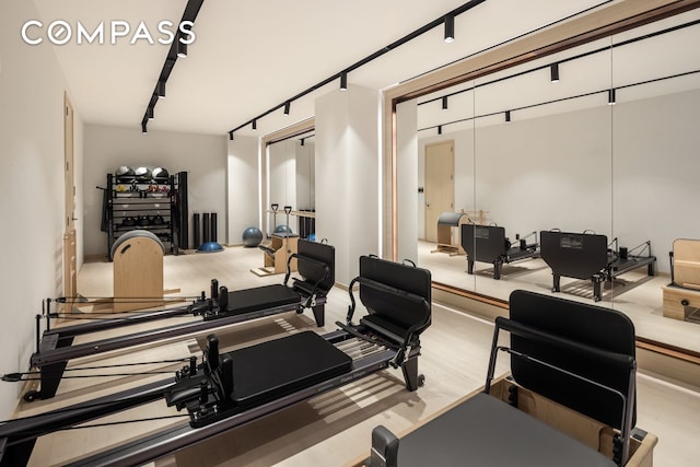 exercise room with track lighting