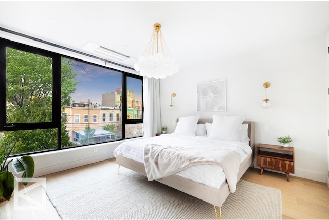 bedroom with light wood-style floors