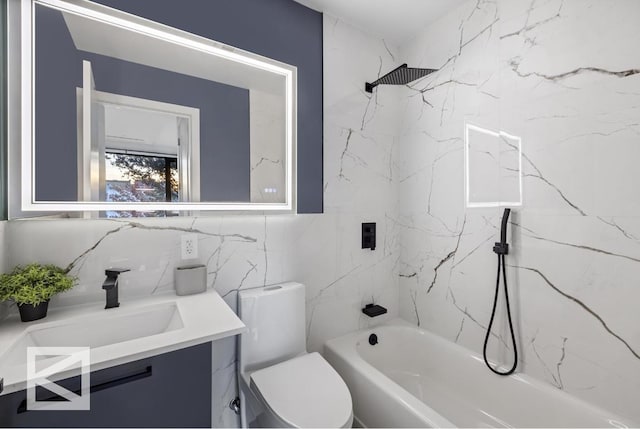 bathroom featuring decorative backsplash, toilet, vanity, tile walls, and shower / bathing tub combination