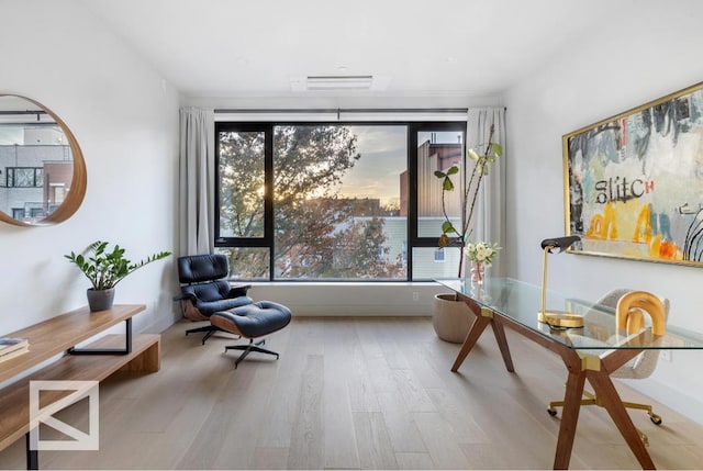 living area featuring light wood-style floors