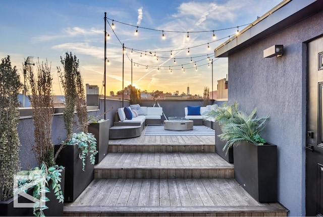 wooden deck with an outdoor hangout area