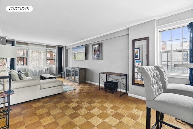 living room with crown molding and parquet floors