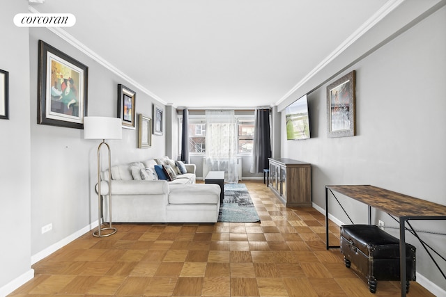 living room with visible vents, crown molding, and baseboards