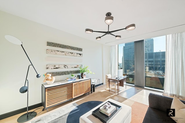 53 W 53rd St Unit 50-B, New York City, NY 10019 - living room featuring a chandelier and wood finished floors