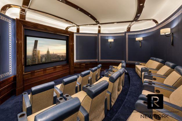 home theater room with carpet flooring