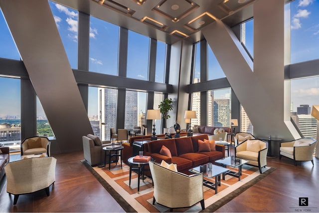 common area with a city view and a towering ceiling