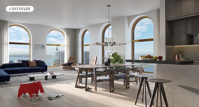 dining space with visible vents, a chandelier, and wood finished floors