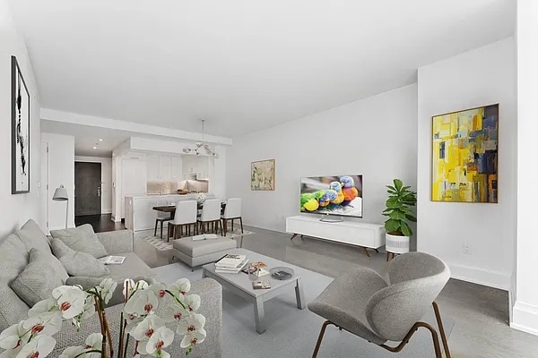 living room with an inviting chandelier