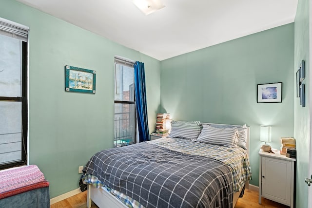 bedroom featuring light wood-type flooring