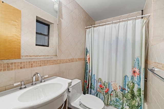 bathroom featuring toilet, vanity, tile walls, and a shower with curtain