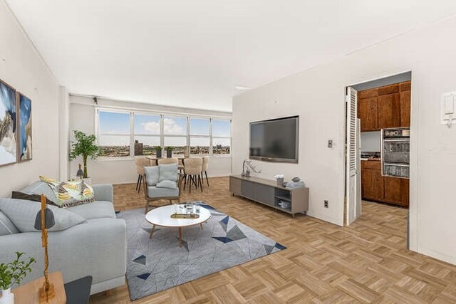 living room with light parquet floors