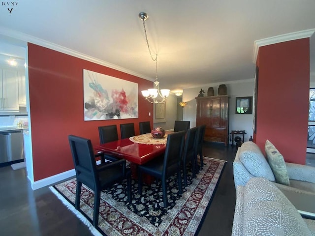 dining area featuring ornamental molding, a notable chandelier, and baseboards