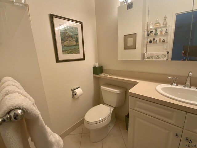 bathroom with tile walls, walk in shower, and vanity