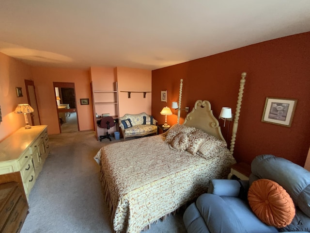 bedroom with light colored carpet