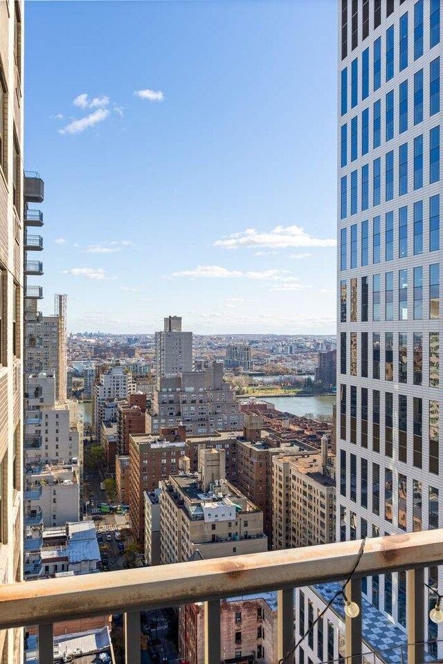 property's view of city with a water view