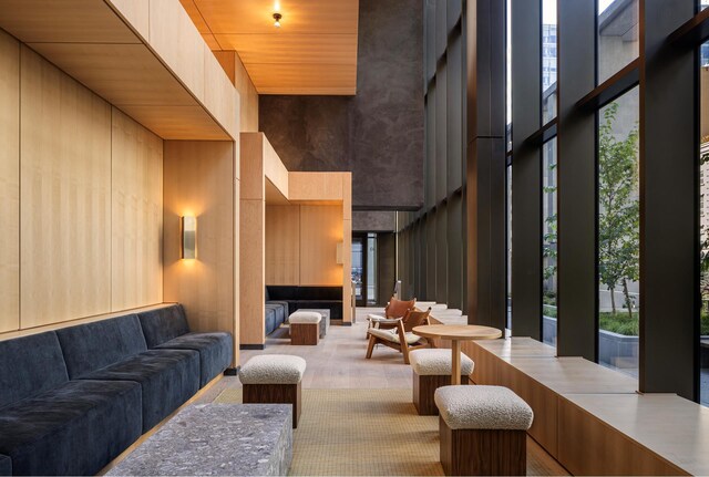 30 Front St Unit 28B, New York City, NY 11201 - building lobby featuring a towering ceiling and a wall of windows
