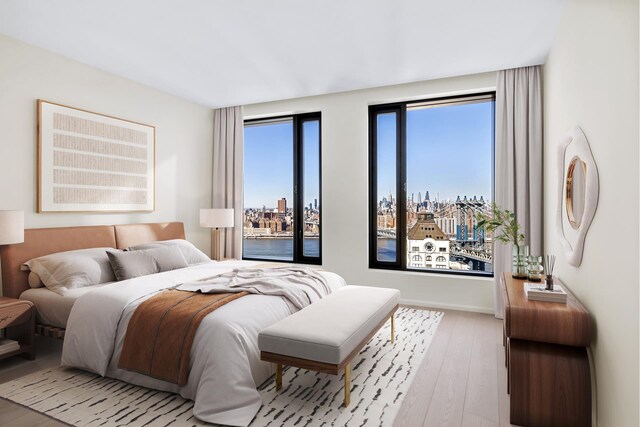 30 Front St Unit 28B, New York City, NY 11201 - bedroom featuring hardwood / wood-style floors and a view of city