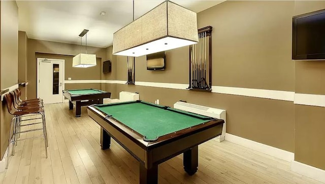 playroom with billiards and light wood-style floors