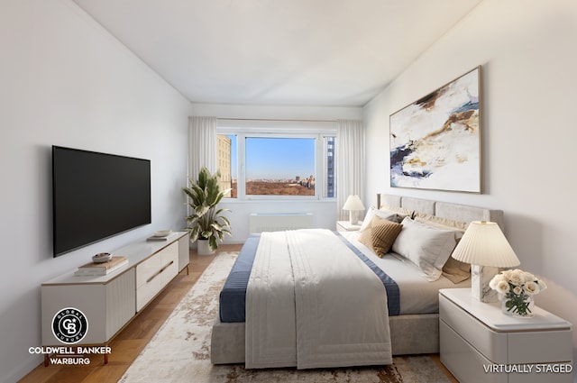 bedroom featuring light hardwood / wood-style flooring