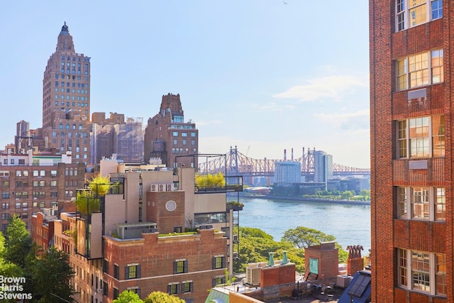 property's view of city with a water view