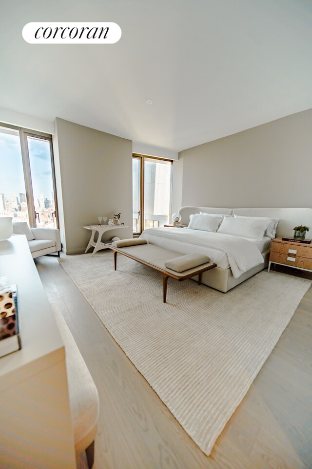 500 W 18th St Unit West30C, New York City, NY 10011 - bedroom featuring wood finished floors