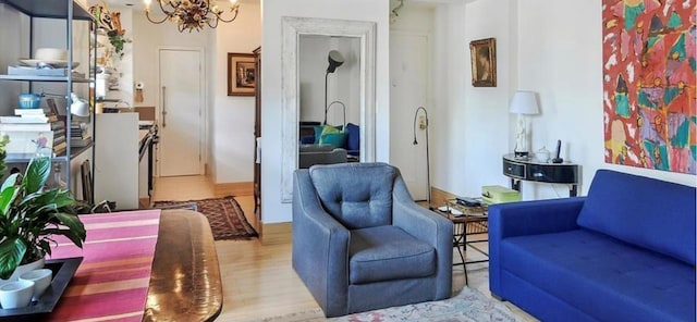269 W 72nd St Unit 16D, New York City, NY 10023 - living area with a chandelier and wood finished floors