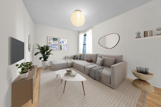 living room with light hardwood / wood-style floors