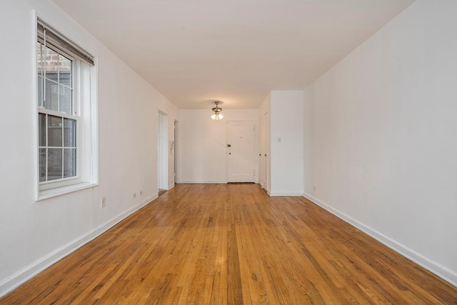 unfurnished room featuring light hardwood / wood-style flooring