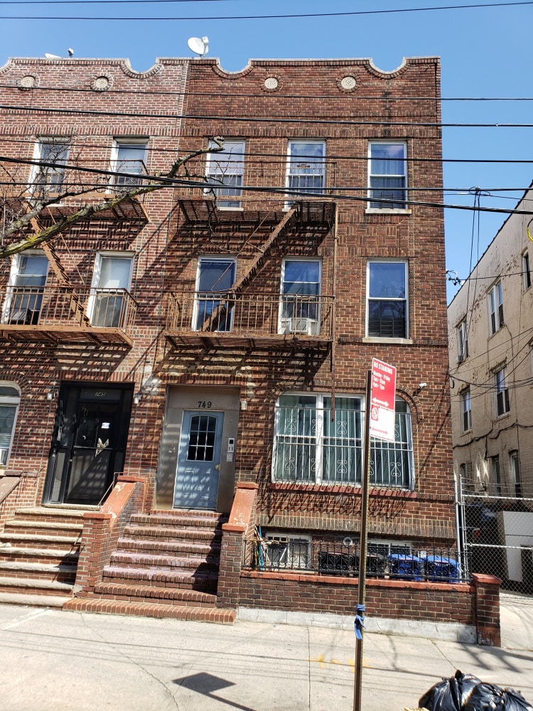 753 Pennsylvania Ave, New York City, NY 11207 - view of apartment building / complex featuring entry steps