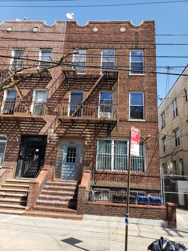 753 Pennsylvania Ave, New York City, NY 11207 - view of apartment building / complex featuring entry steps