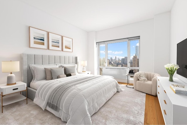 bedroom with light hardwood / wood-style flooring