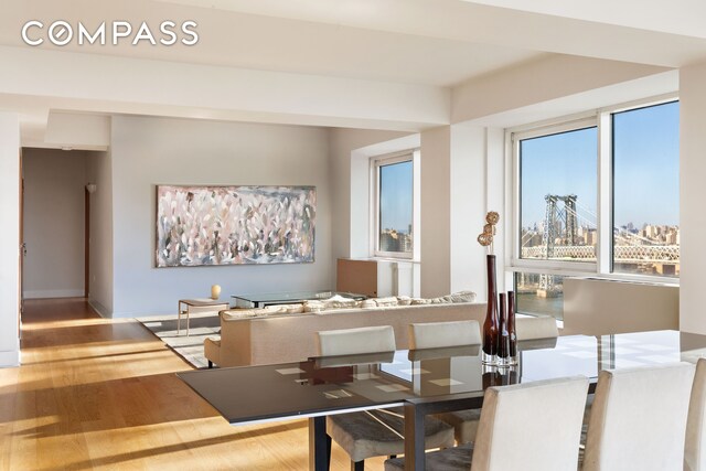 440 Kent Ave Unit 22C, New York City, NY 11249 - dining area with wood finished floors