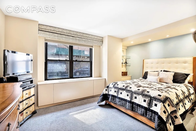 bedroom with recessed lighting and light colored carpet