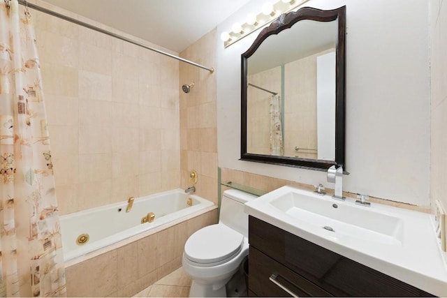 full bathroom with tile patterned floors, vanity, tile walls, toilet, and shower / bath combo with shower curtain