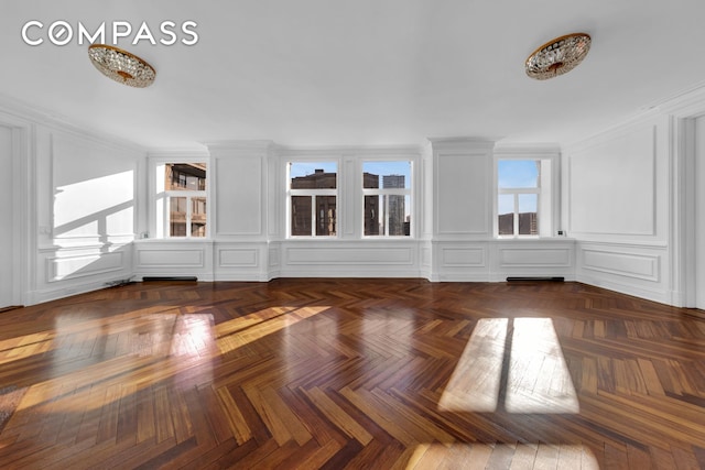 465 Park Ave Unit 34E, New York City, NY 10022 - spare room with a decorative wall and crown molding