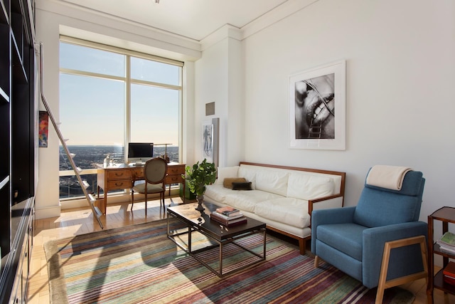 living room featuring visible vents and crown molding