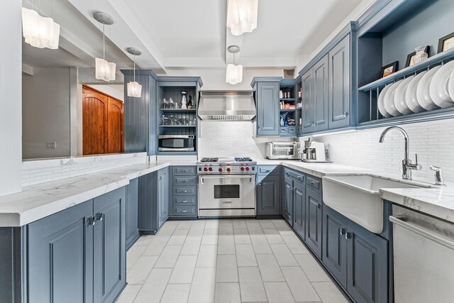 kitchen featuring pendant lighting, decorative backsplash, appliances with stainless steel finishes, wall chimney exhaust hood, and light stone counters