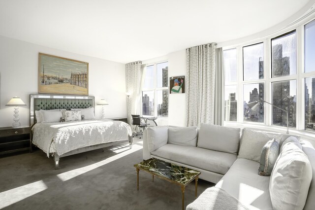 181 E 90th St Unit Ph-32A, New York City, NY 10128 - bedroom with multiple windows and carpet