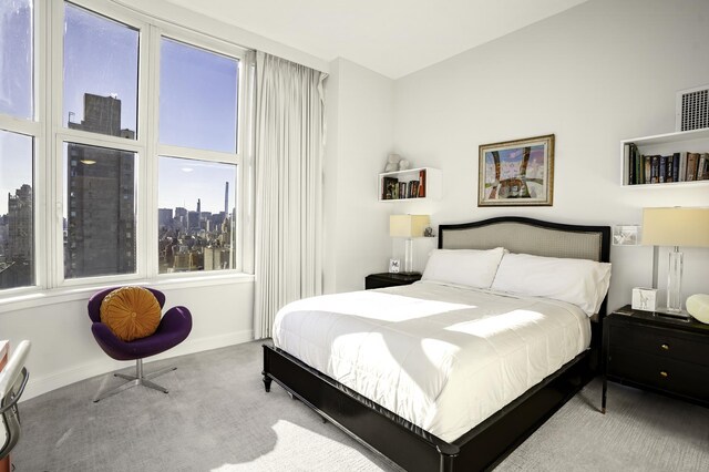 181 E 90th St Unit Ph-32A, New York City, NY 10128 - carpeted bedroom featuring baseboards