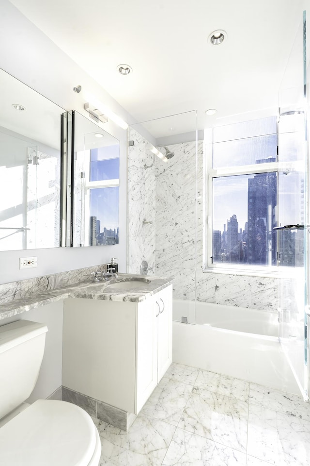 full bathroom featuring toilet, a skyline view, vanity, bathing tub / shower combination, and recessed lighting
