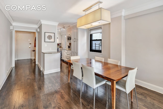 411 E 57th St Unit 11Ab, New York City, NY 10022 - dining space with dark wood-style flooring, crown molding, and baseboards
