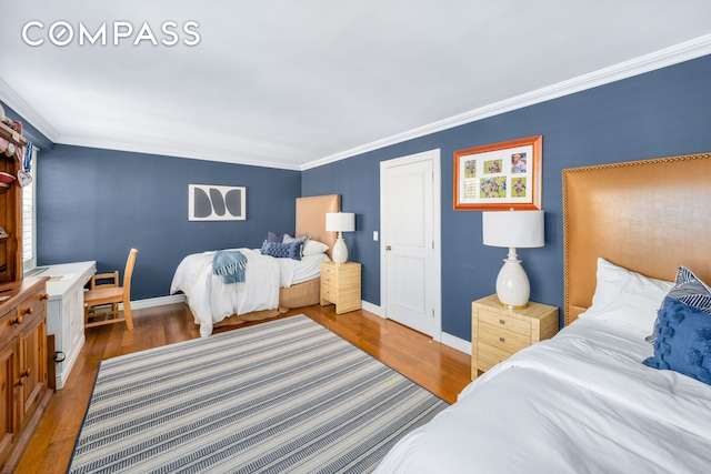 444 E 84th St Phe, Phe, New York City, NY 10028 - bedroom featuring crown molding and wood finished floors