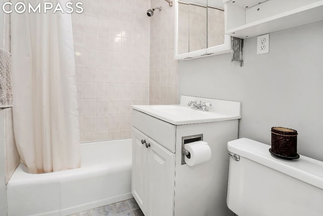 full bathroom with toilet, vanity, and shower / tub combo with curtain