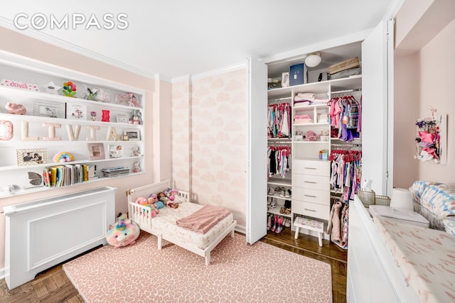 345 E 56th St Unit 11C, New York City, NY 10022 - bedroom with a closet and ornamental molding