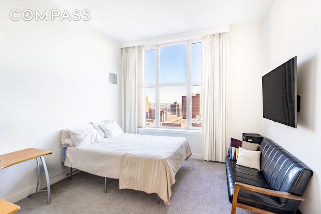 181 E 90th St Unit Ph32A, New York City, NY 10128 - bedroom with multiple windows and carpet floors