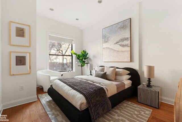 interior space featuring light hardwood / wood-style floors and ornamental molding