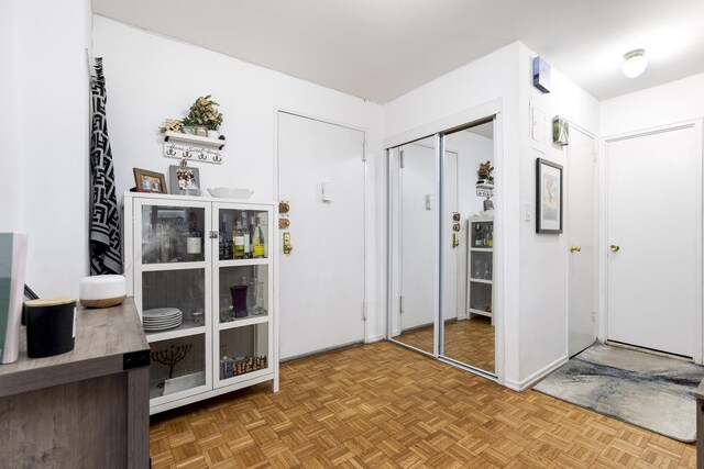 living room featuring parquet floors