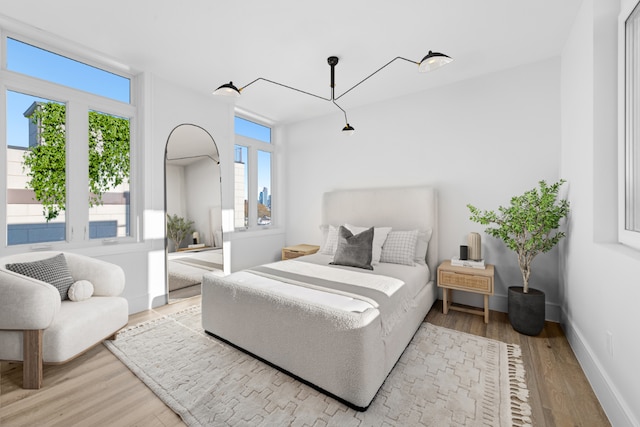 bedroom featuring hardwood / wood-style flooring